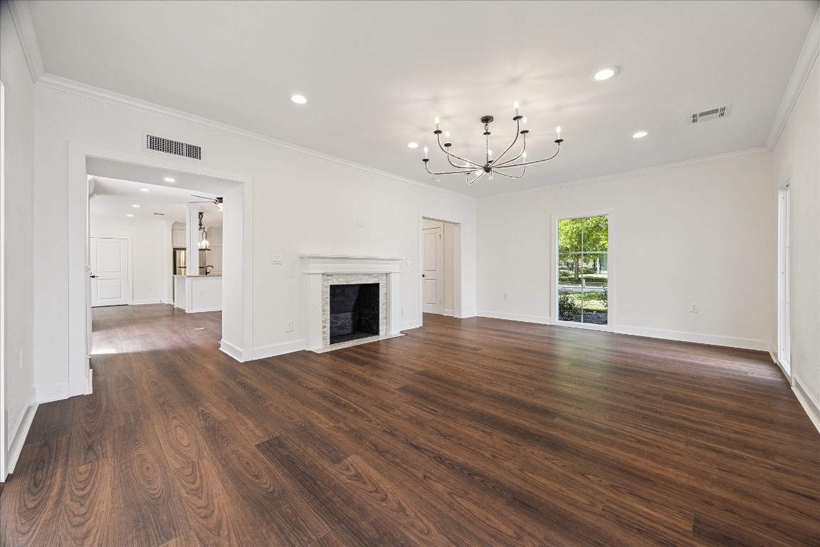 3071 Locke Lane Houston, TX 77019 - Photo 7 of 44 This dining room offers crown molding, and a striking designer chandelier paired with recessed can lighting. Brightened by north- and east-facing windows, the space opens to the family room, perfect for effortless entertaining and gatherings.
