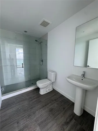 a bathroom with a sink and a toilet