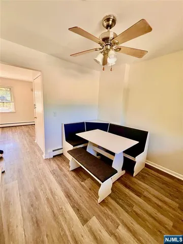 a workspace with wooden floor