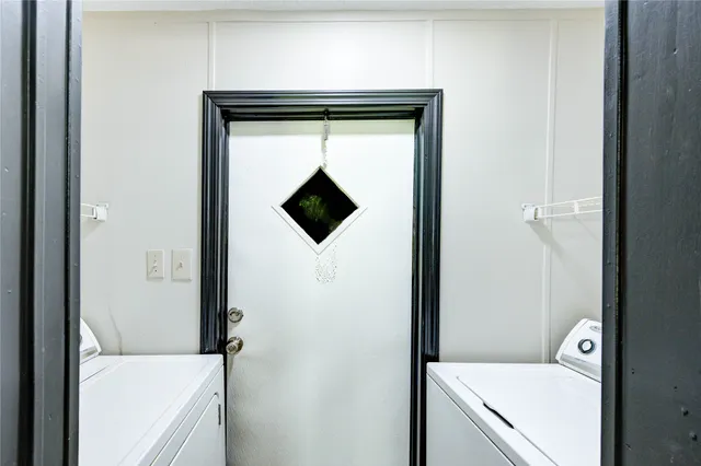 a utility room with a washer and dryer