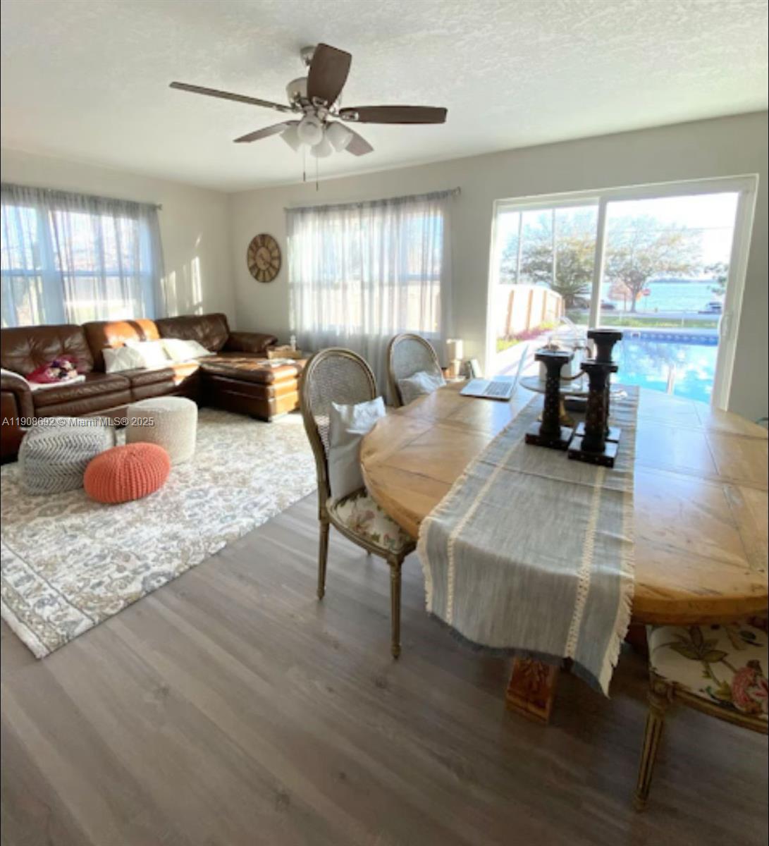 1065 North 10th Street Eagle Lake, FL 33839 - Photo 4 of 8 a living room with furniture and a large window