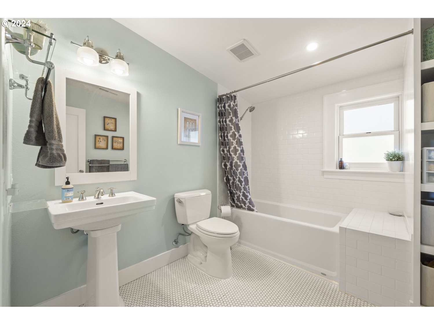 3029 Southwest Sunset Boulevard Portland, OR 97239 - Photo 22 of 48 a bathroom with a sink toilet and shower