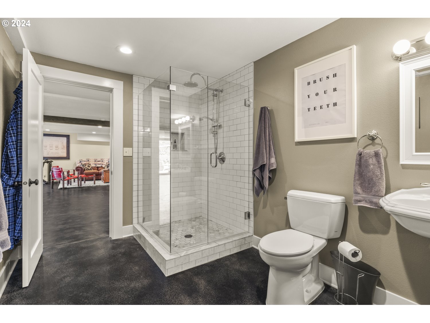 3029 Southwest Sunset Boulevard Portland, OR 97239 - Photo 25 of 48 a bathroom with a toilet sink and shower