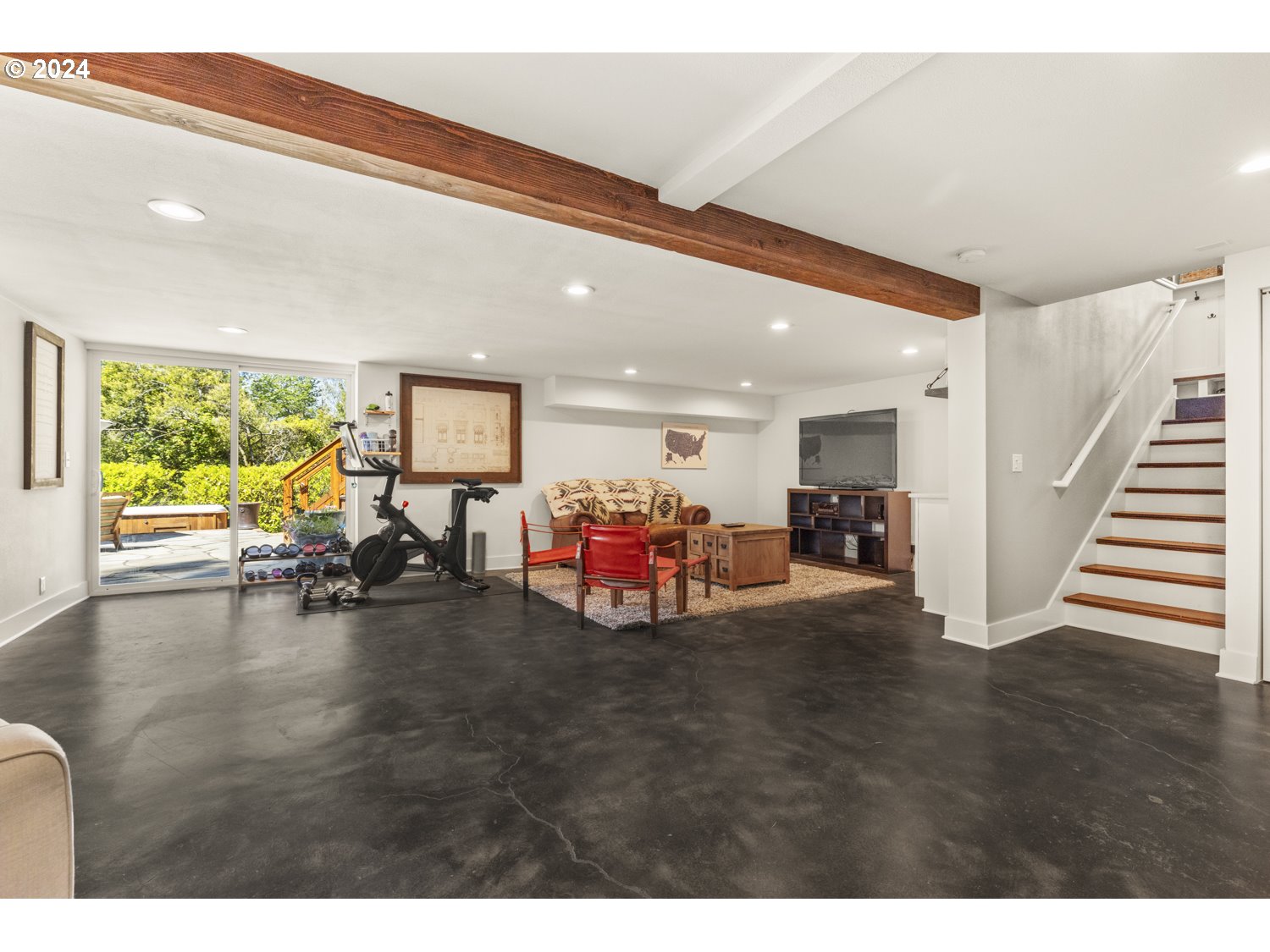 3029 Southwest Sunset Boulevard Portland, OR 97239 - Photo 29 of 48 a living room with furniture and a large window