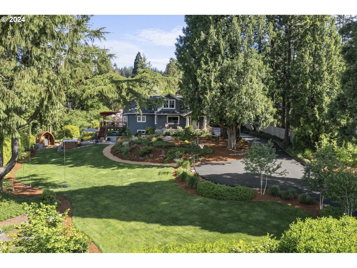 3029 Southwest Sunset Boulevard Portland, OR 97239 - Photo 41 of 48 a view of a park with large trees