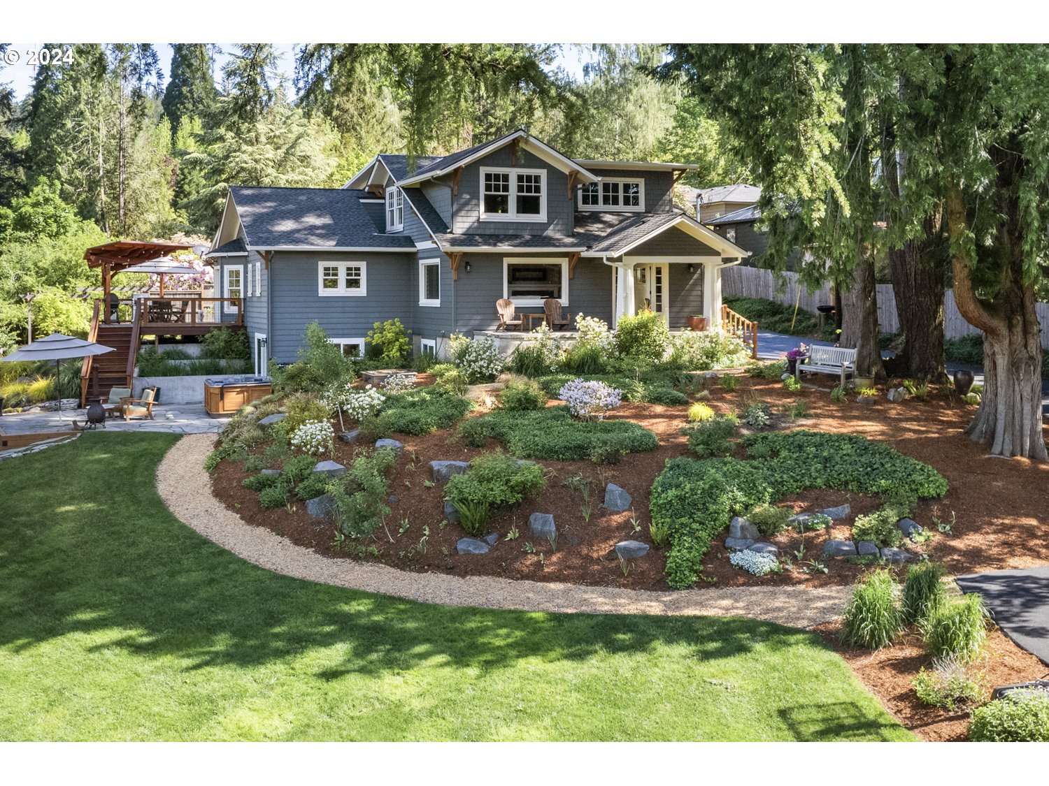 3029 Southwest Sunset Boulevard Portland, OR 97239 - Photo 46 of 48 a front view of a house with a yard