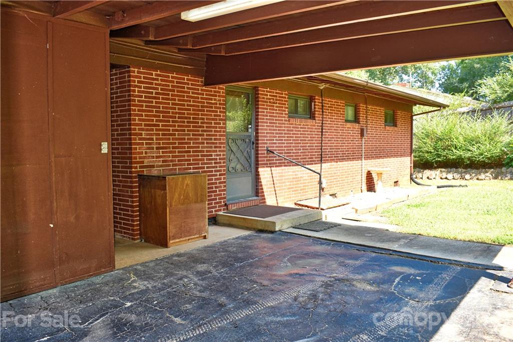 700 Mountain Creek Road Albemarle, NC 28001 - Photo 11 of 48 a view of a backyard of the house