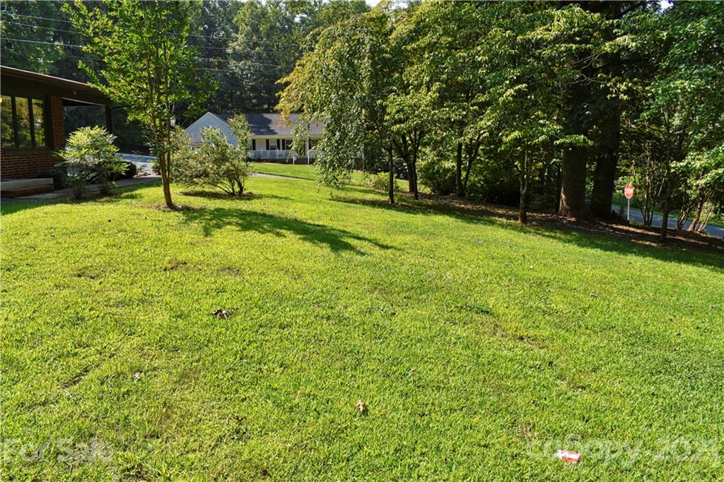 700 Mountain Creek Road Albemarle, NC 28001 - Photo 29 of 48 a view of a park with large trees
