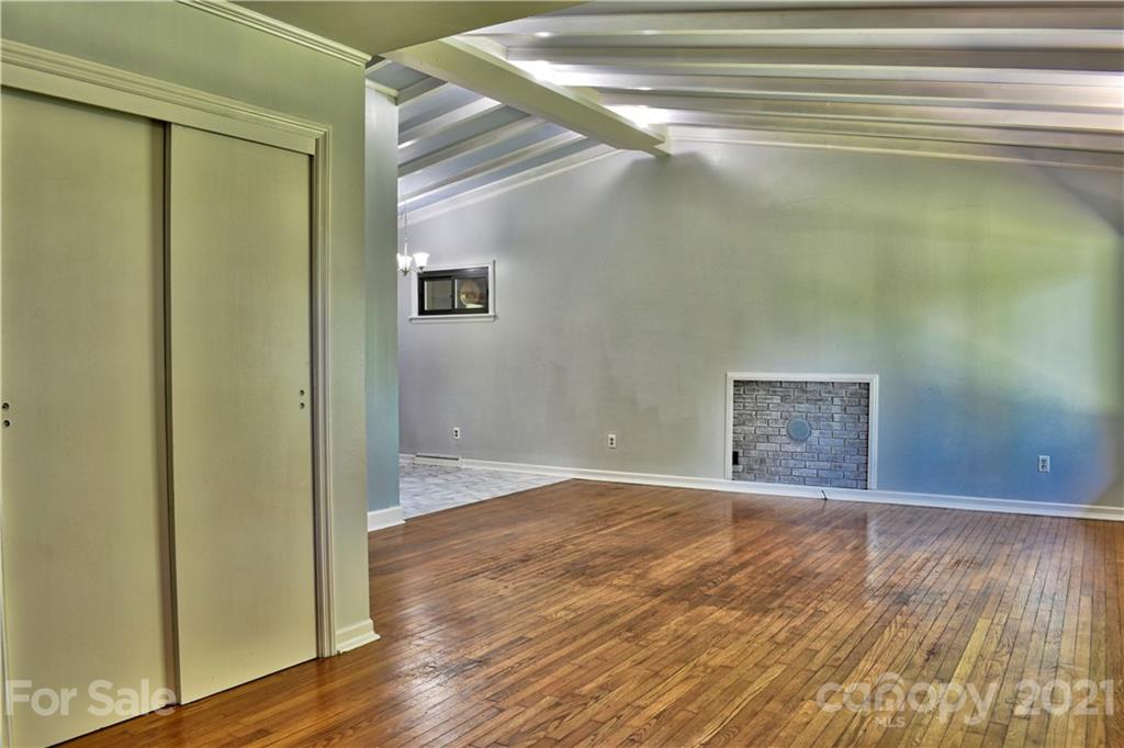 700 Mountain Creek Road Albemarle, NC 28001 - Photo 35 of 48 a view of an empty room and wooden floor