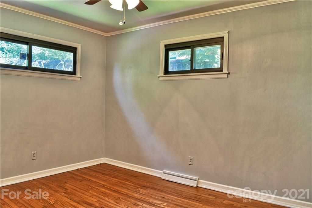 700 Mountain Creek Road Albemarle, NC 28001 - Photo 40 of 48 a view of empty room with wooden floor