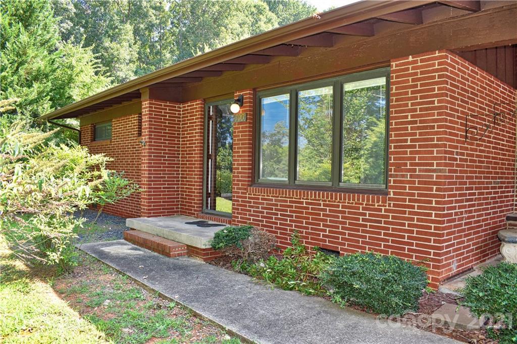 700 Mountain Creek Road Albemarle, NC 28001 - Photo 5 of 48 a front view of a house with garden