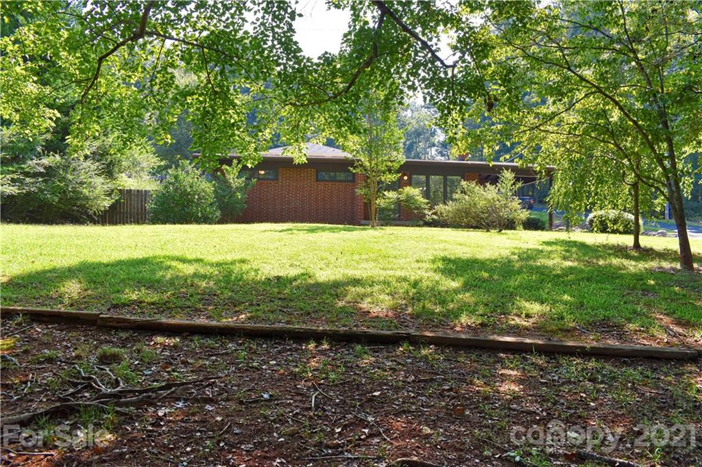 700 Mountain Creek Road Albemarle, NC 28001 - Photo 45 of 48 a view of a yard with large trees