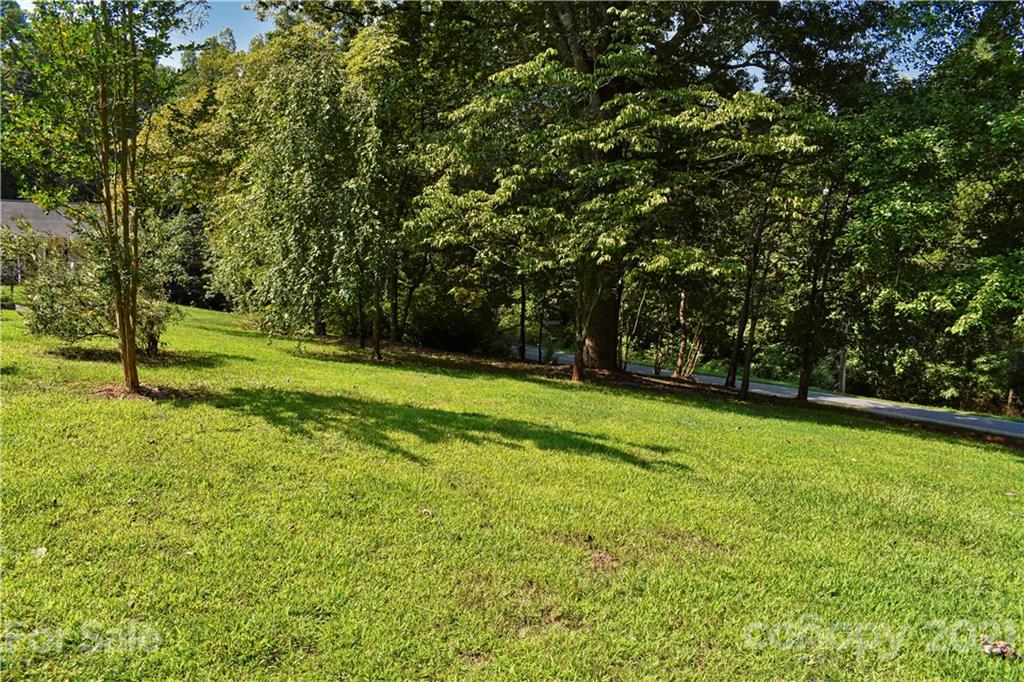 700 Mountain Creek Road Albemarle, NC 28001 - Photo 47 of 48 a view of outdoor space with deck and yard
