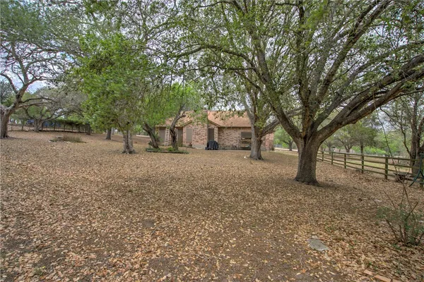 a house with trees in front of it