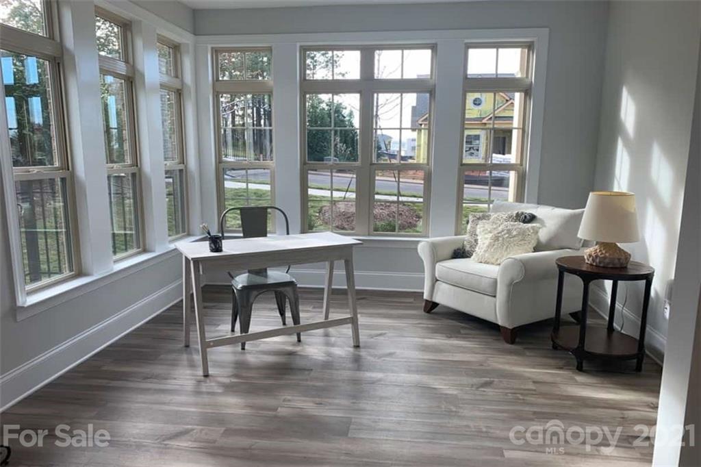 2070 New Style Way, Unit 39 Tega Cay, SC 29708 - Photo 7 of 12 a living room with furniture and a large window