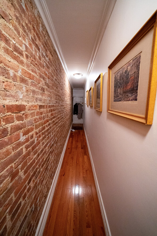 236 East 78th Street, Unit 4B Manhattan, NY 10075 - Photo 8 of 11 a view of entryway with wooden floor