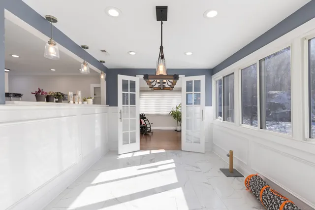 a view of a living room and window