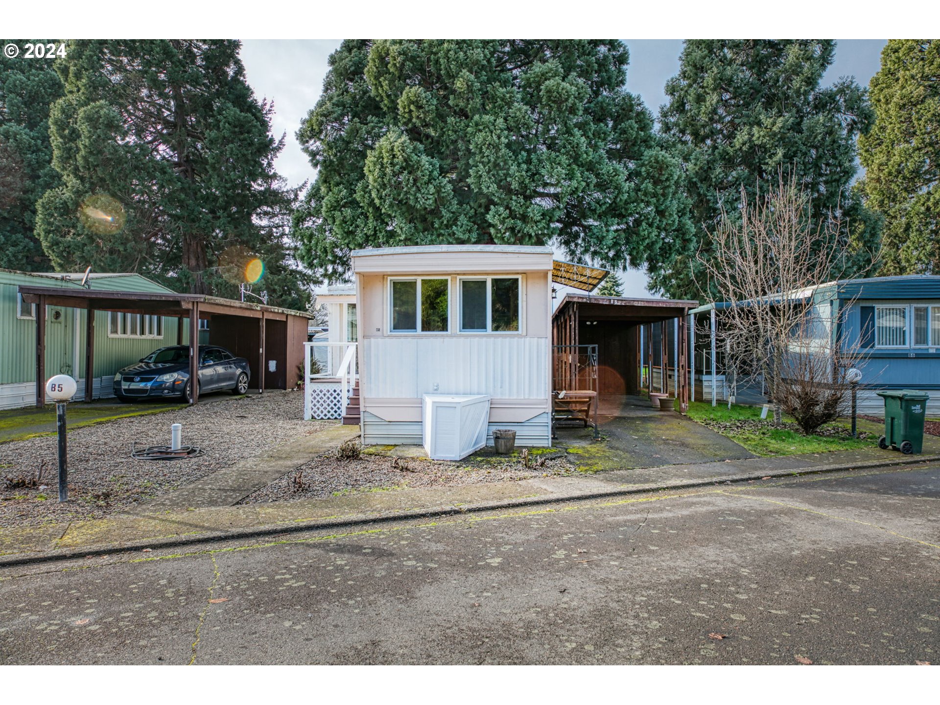 1625 Henderson Avenue Eugene, OR 97403 - Photo 17 of 20 a view of a house with a yard and large tree