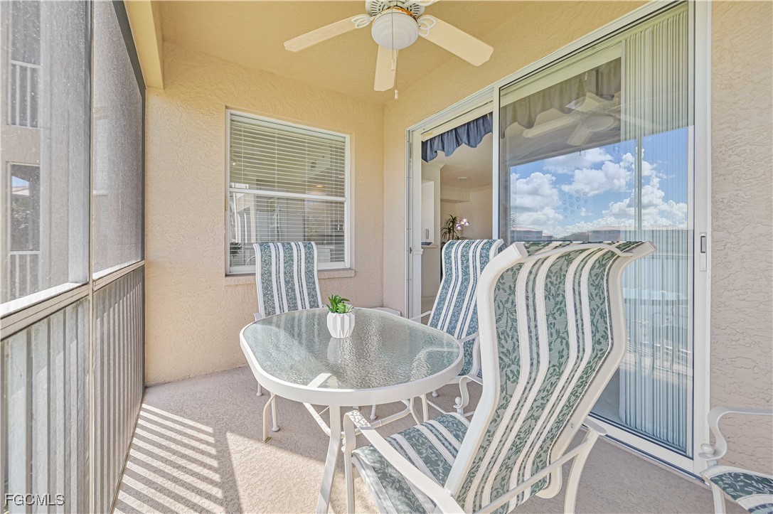 14121 Brant Point Circle, Unit 1202 Fort Myers, FL 33919 - Photo 15 of 47 a dining room with furniture and window
