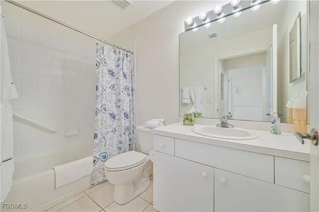 a view of storage and utility room with washer and dryer
