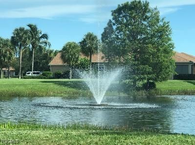 14121 Brant Point Circle, Unit 1202 Fort Myers, FL 33919 - Photo 28 of 47 a view of a water fountain in front of a house