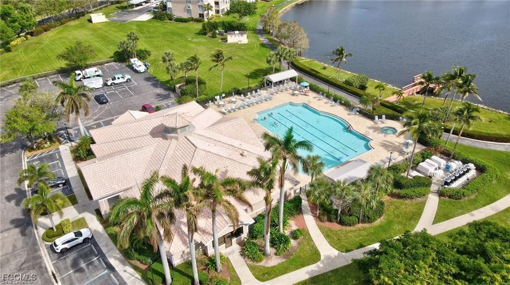 14121 Brant Point Circle, Unit 1202 Fort Myers, FL 33919 - Photo 41 of 47 an aerial view of a house yard and swimming pool
