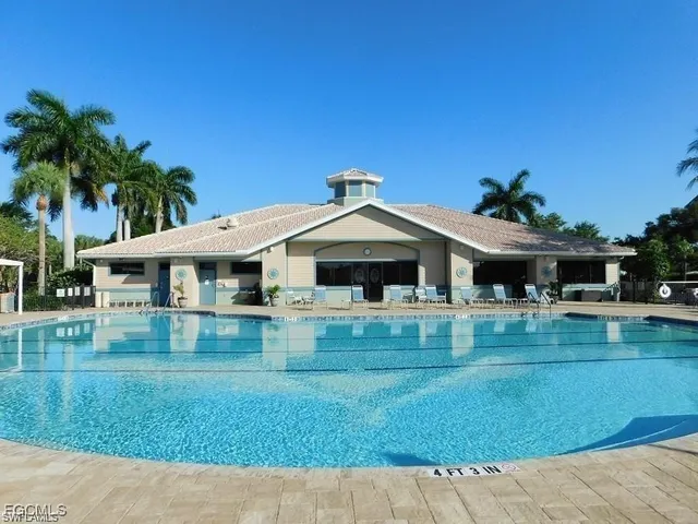 a view of a swimming pool and lake view