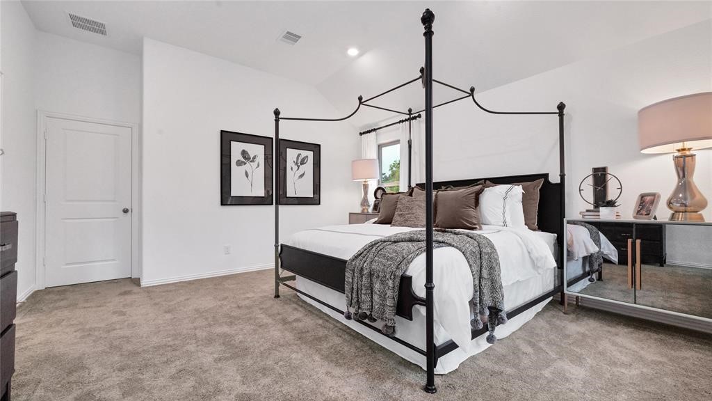 542 Dry Fork Lane Conroe, TX 77304 - Photo 7 of 9 a bed room with a bed and a night stand