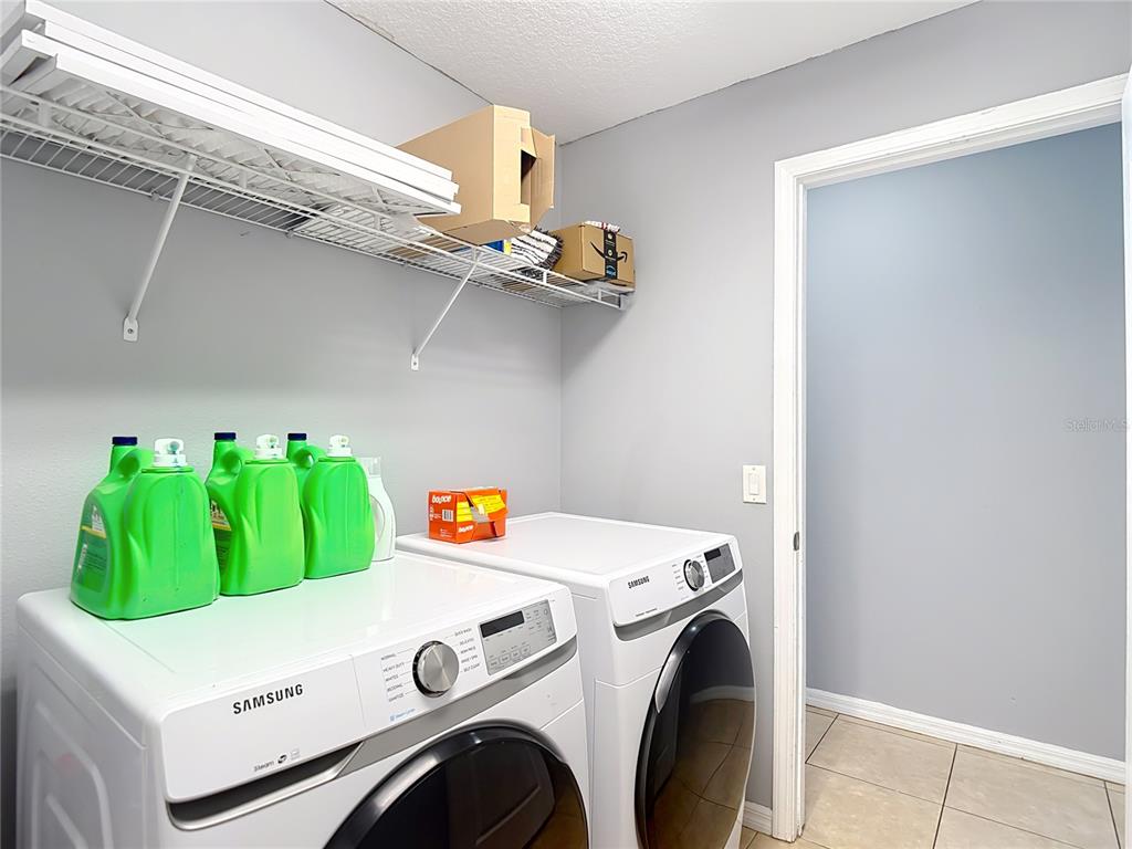 12153 South Bridge Terrace Hudson, FL 34669 - Photo 37 of 60 a utility room with dryer and washer