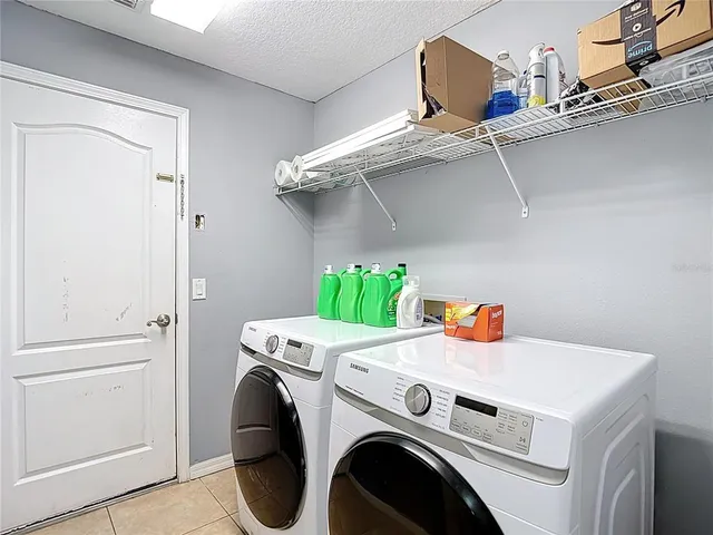 a bathroom with a sink double vanity and a mirror