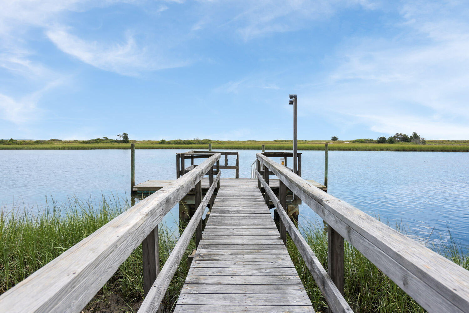 159 Main Street Osterville, MA 02655 - Photo 12 of 56 a view of a wooden bridge