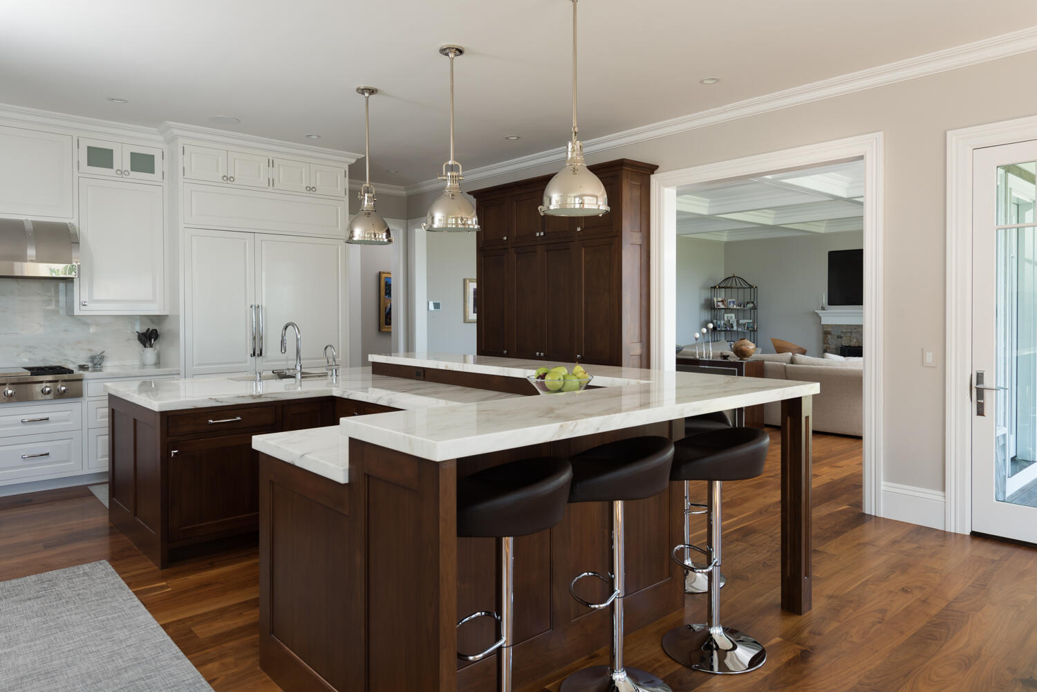 159 Main Street Osterville, MA 02655 - Photo 25 of 56 a kitchen with kitchen island a sink stove and wooden floor