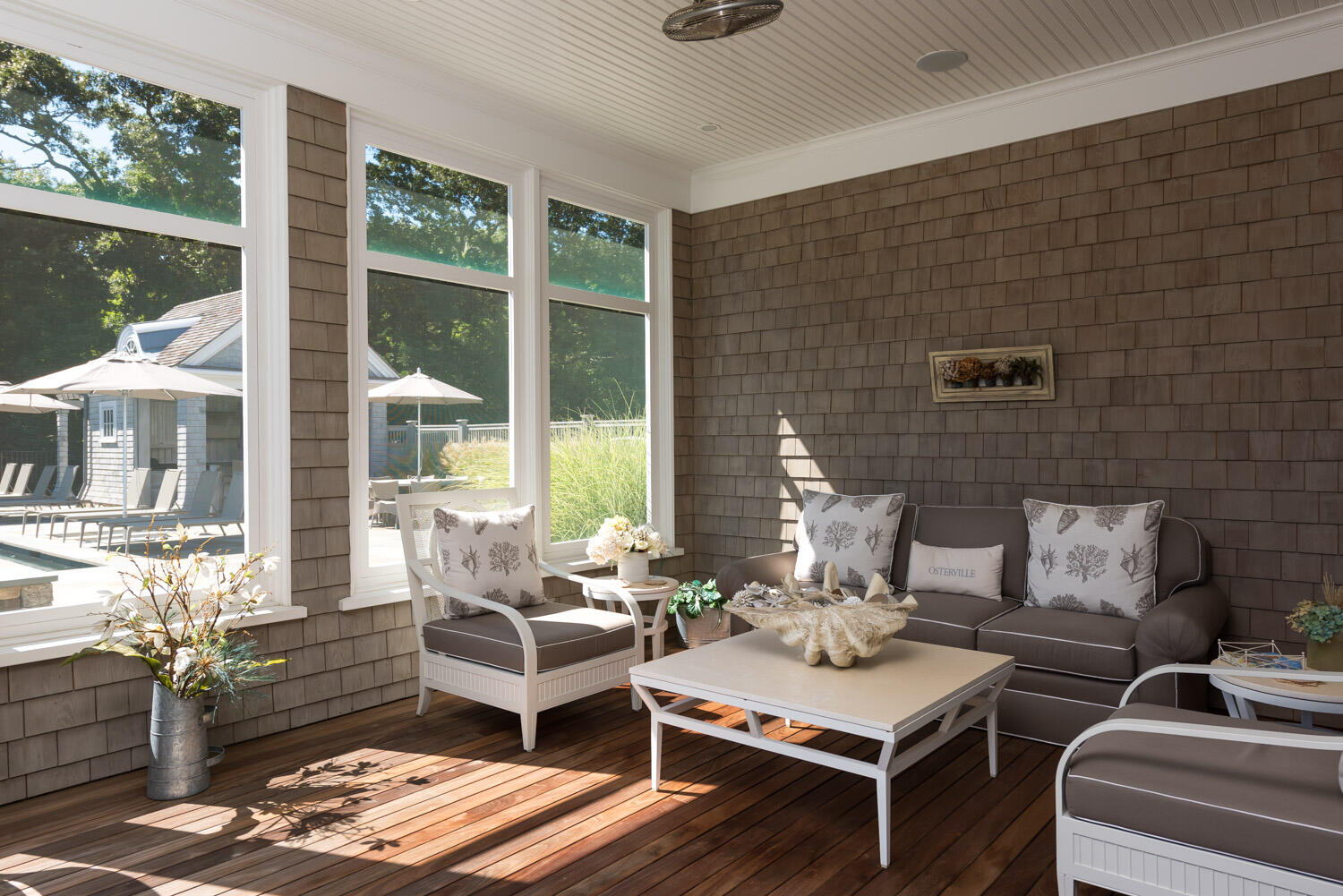 159 Main Street Osterville, MA 02655 - Photo 31 of 56 a living room with furniture and a floor to ceiling window