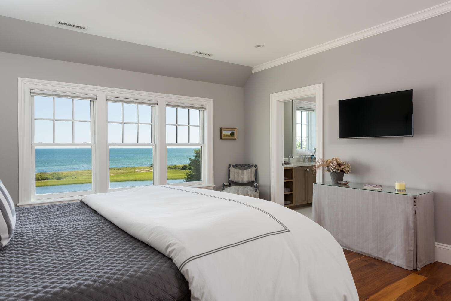 159 Main Street Osterville, MA 02655 - Photo 40 of 56 a bedroom with a bed and a flat screen tv