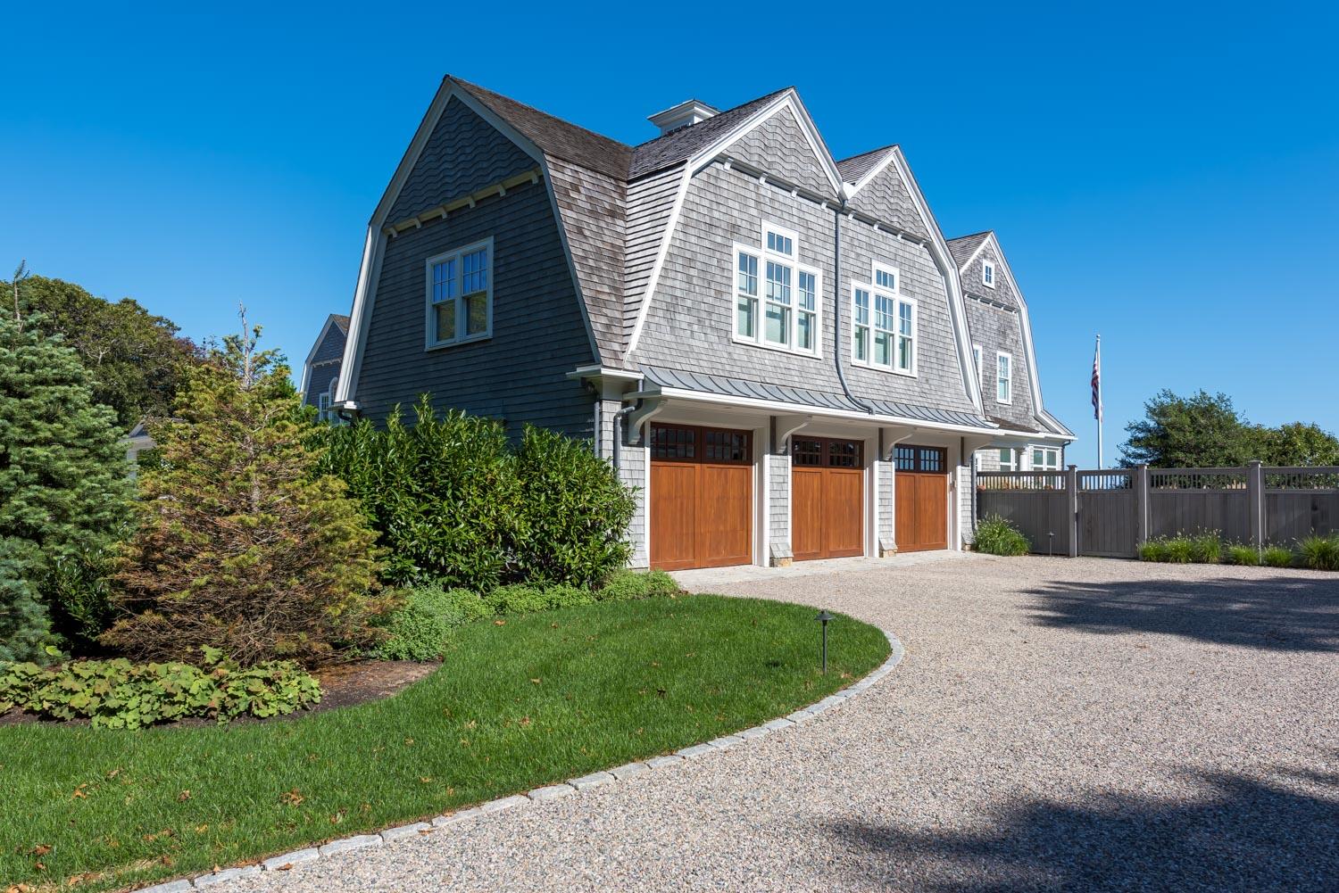 159 Main Street Osterville, MA 02655 - Photo 48 of 56 a front view of a house with a yard