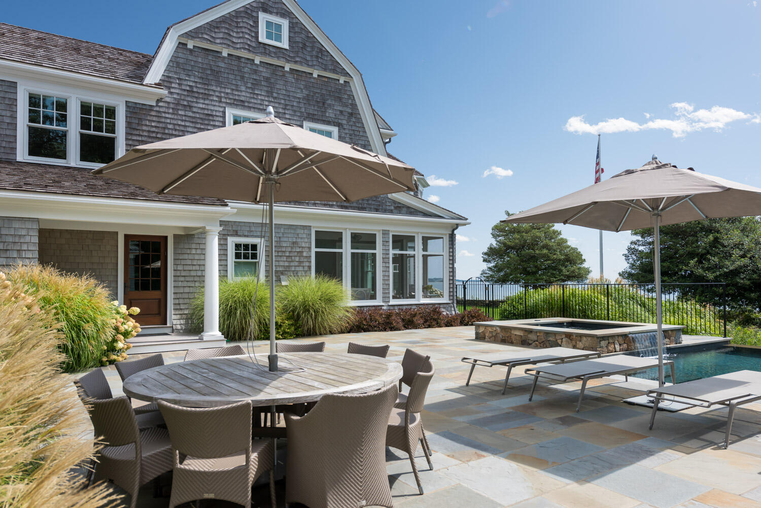 159 Main Street Osterville, MA 02655 - Photo 7 of 56 a view of a house with backyard sitting area and furniture