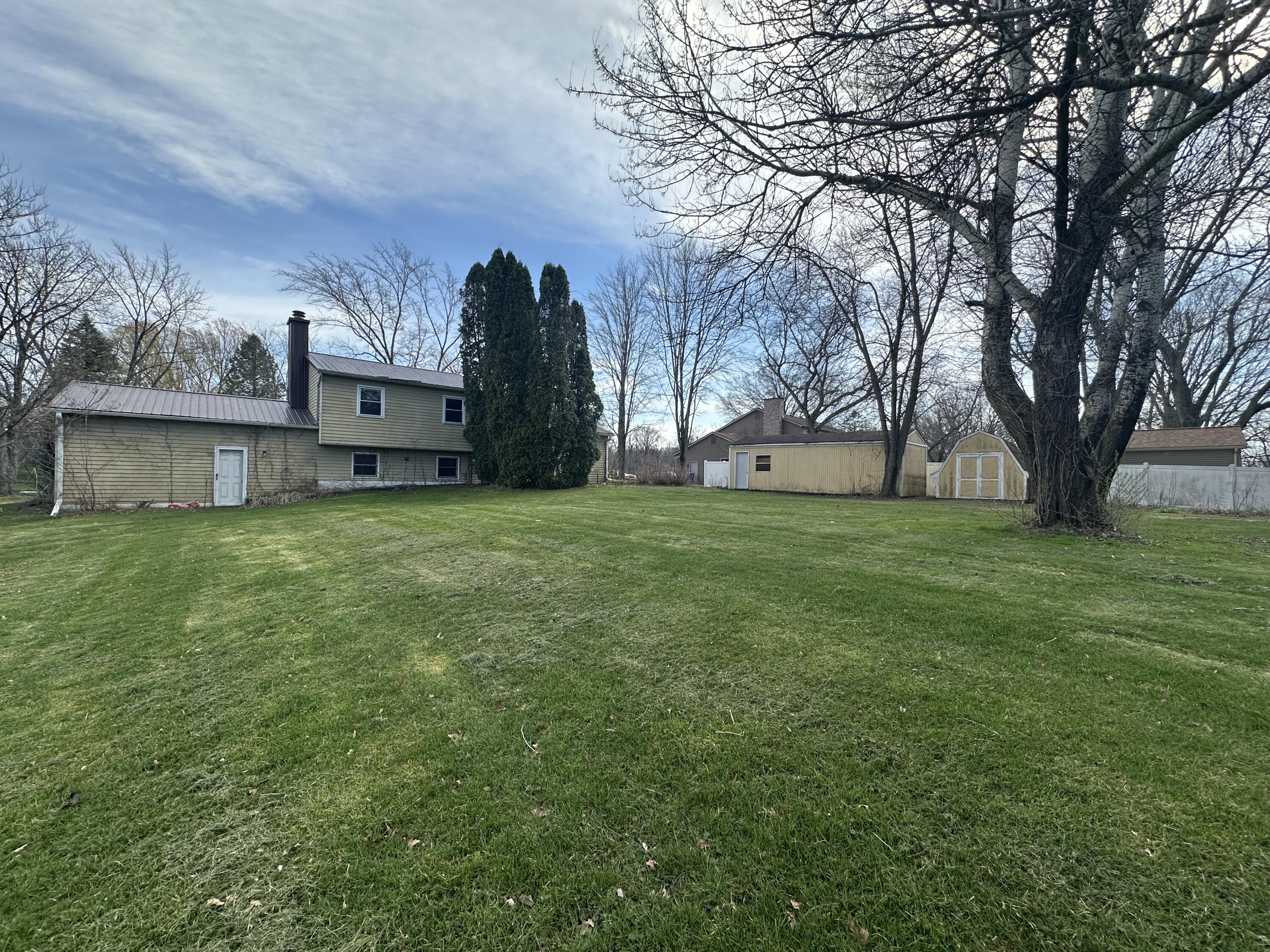 67 Brookview Lane Valparaiso, IN 46385 - Photo 15 of 16 a view of a house with a yard