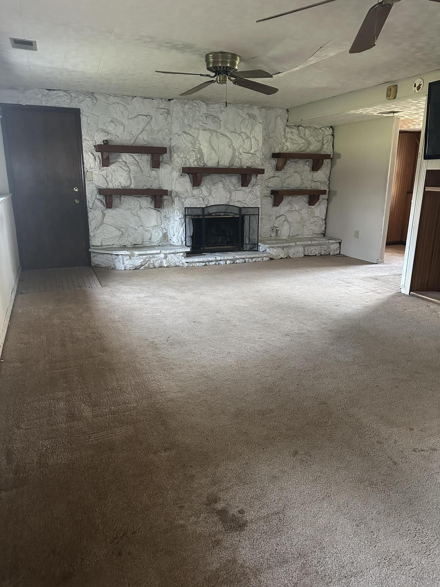 67 Brookview Lane Valparaiso, IN 46385 - Photo 6 of 16 a view of empty room with a fireplace