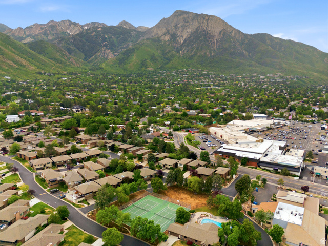 3674 Oak Rim Way Salt Lake City, UT 84109 - Photo 46 of 47 Expansive aerial perspective showcasing a residential community with abundant mature trees and mountainous terrain