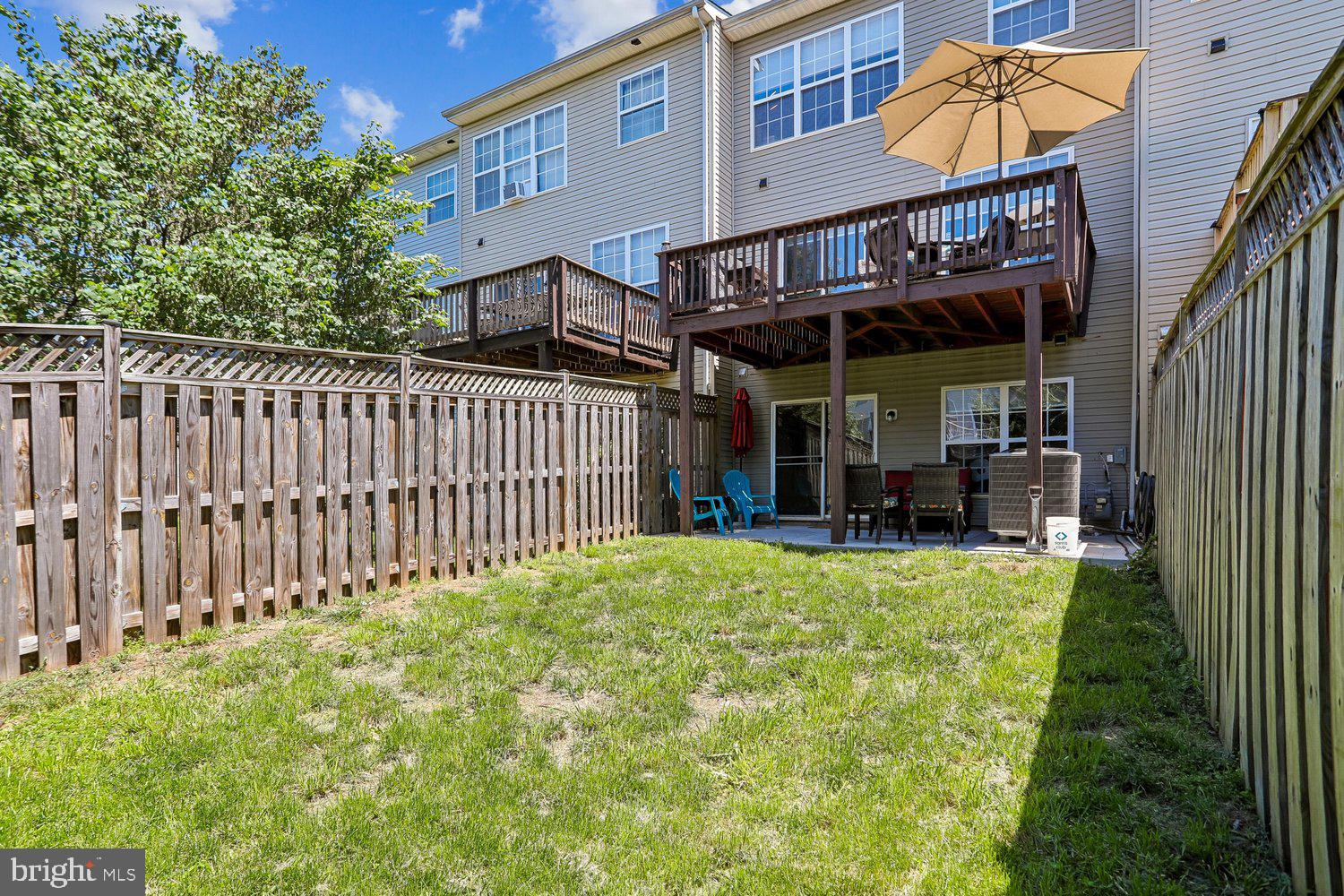 2530 Carrington Way Frederick, MD 21702 - Photo 36 of 38 a view of a house with backyard and sitting area