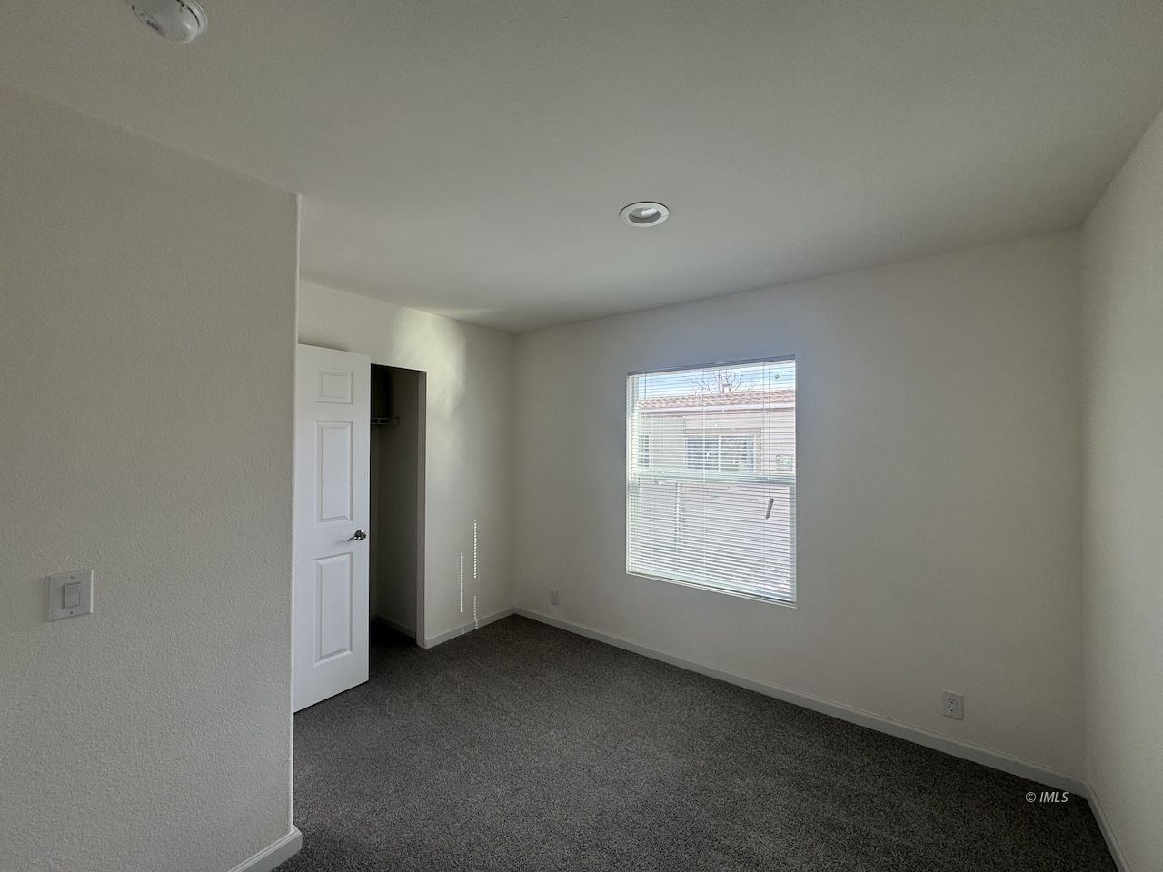 427 North Jackson Street Independence, CA 93526 - Photo 15 of 21 an empty room with a window