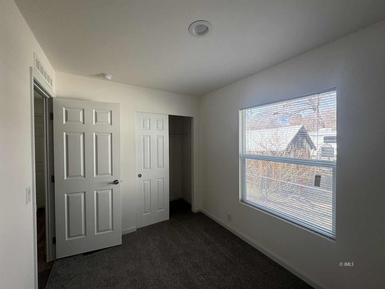 427 North Jackson Street Independence, CA 93526 - Photo 16 of 21 an empty room with windows