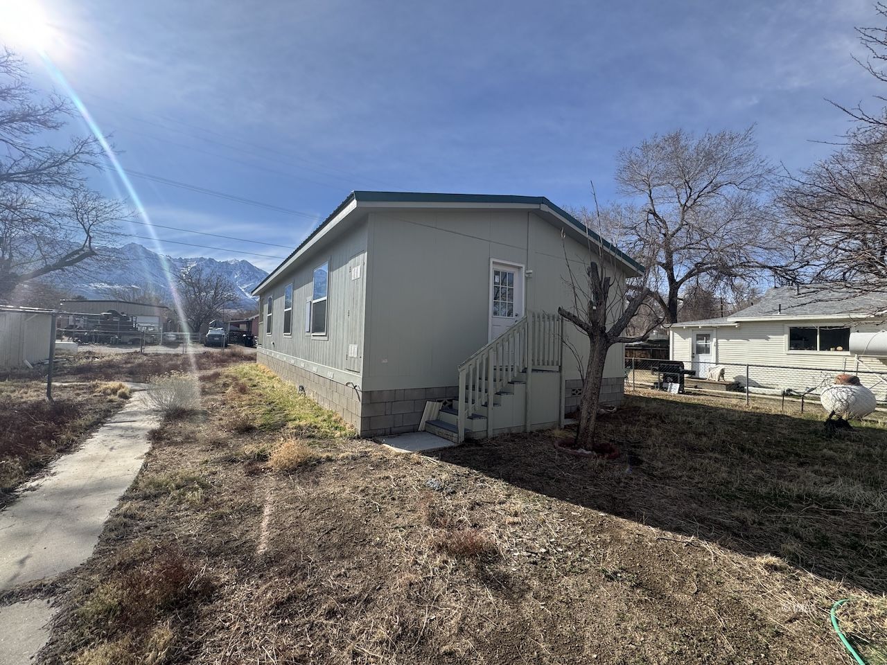 427 North Jackson Street Independence, CA 93526 - Photo 20 of 21 a view of a house with a yard