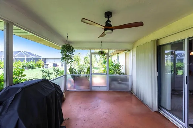 a view of a house with swimming pool and a yard