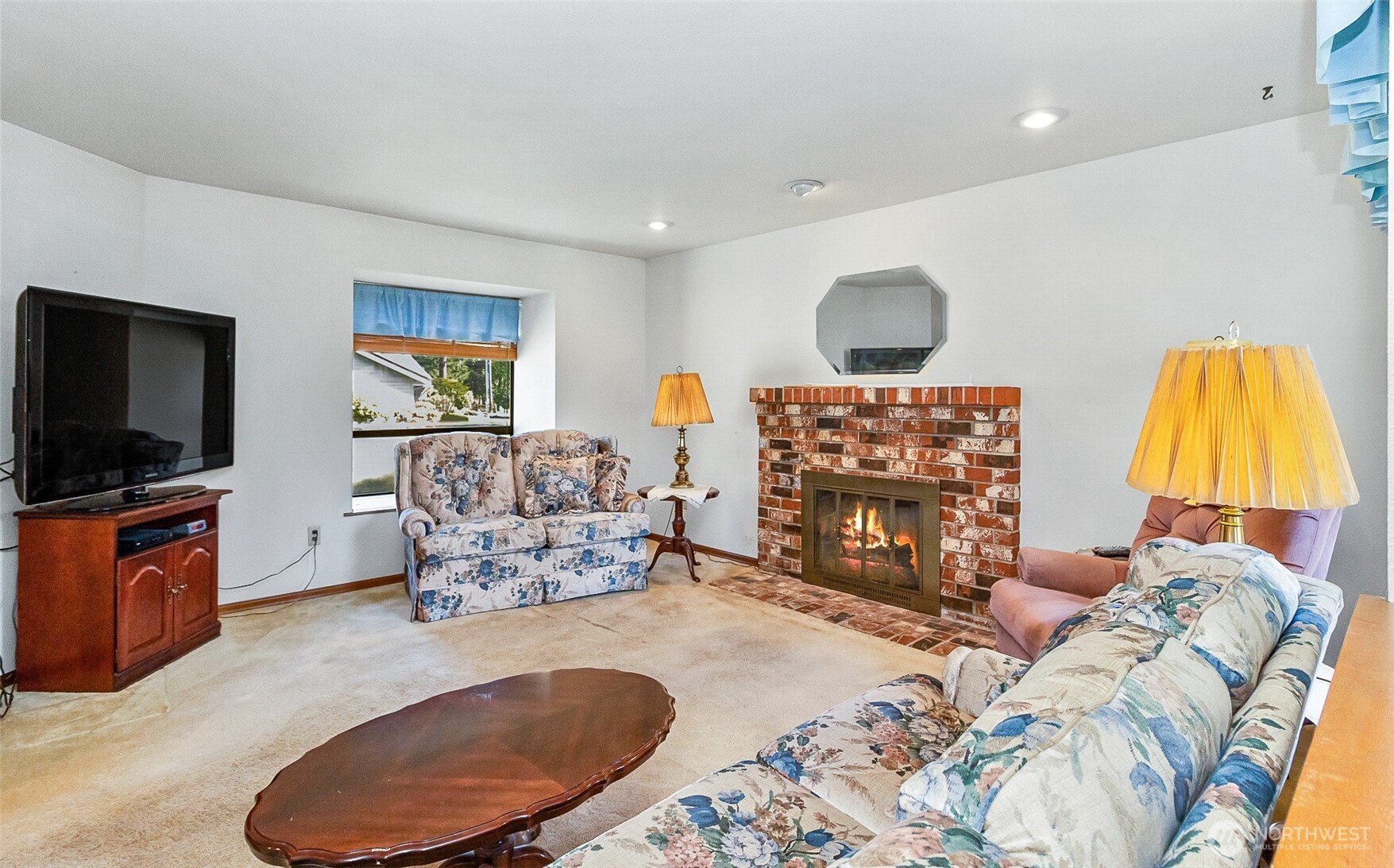 1324 Boise Street Fircrest, WA 98466 - Photo 15 of 39 a living room with furniture and a flat screen tv