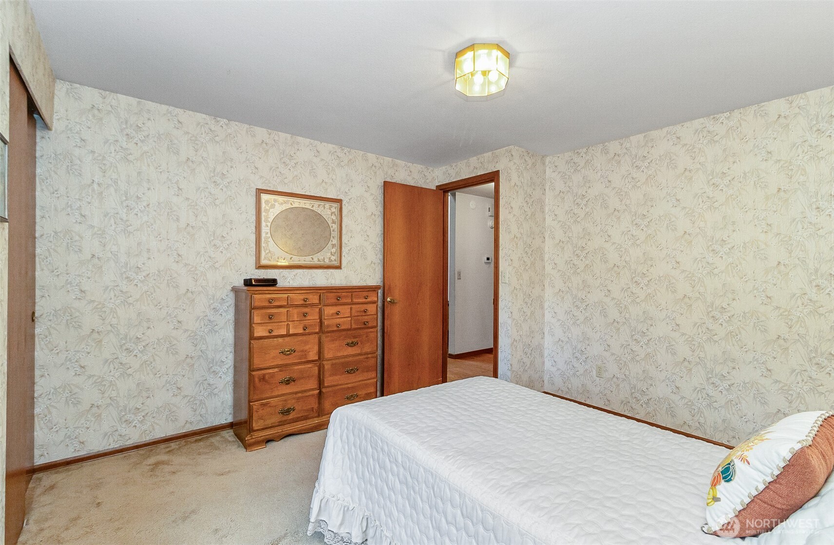1324 Boise Street Fircrest, WA 98466 - Photo 29 of 39 a bedroom with a bed and a cabinets
