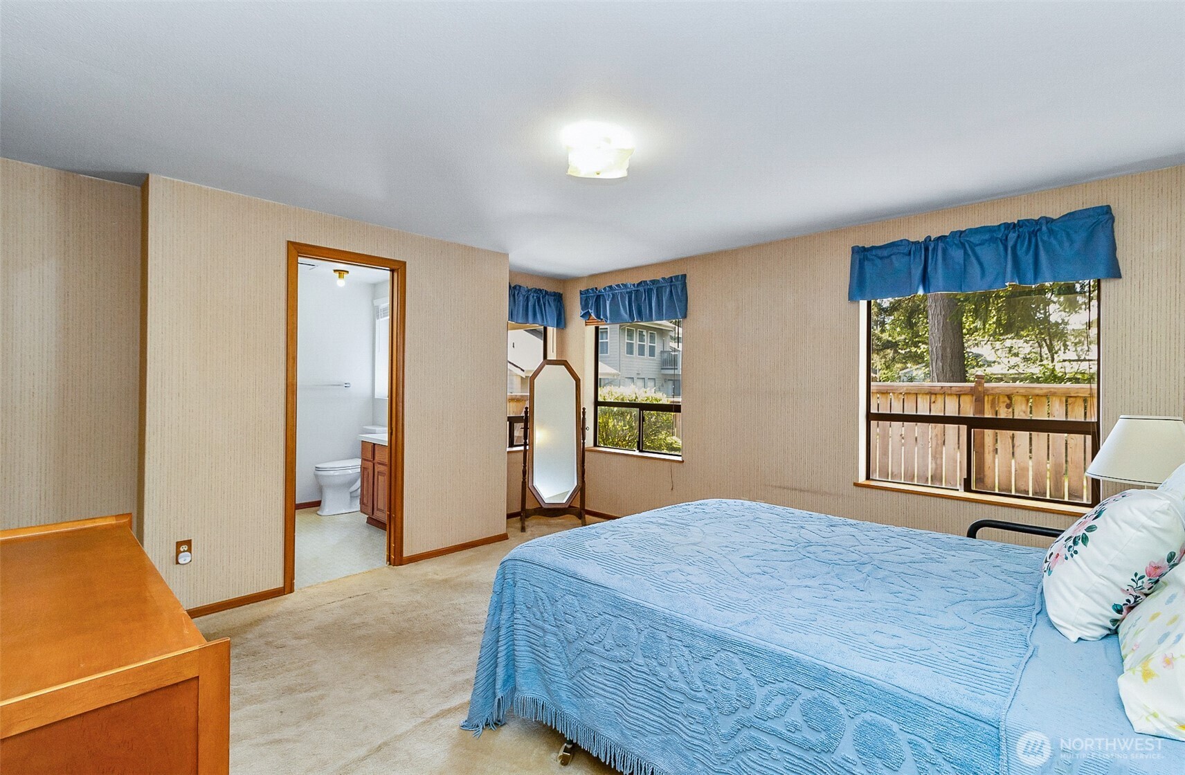 1324 Boise Street Fircrest, WA 98466 - Photo 33 of 39 a bedroom with a bed and a window