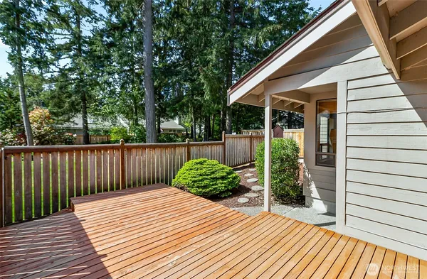 a balcony with wooden floor
