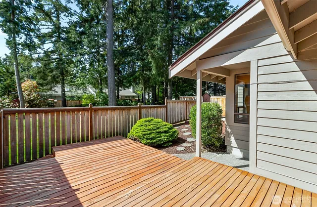 a balcony with wooden floor