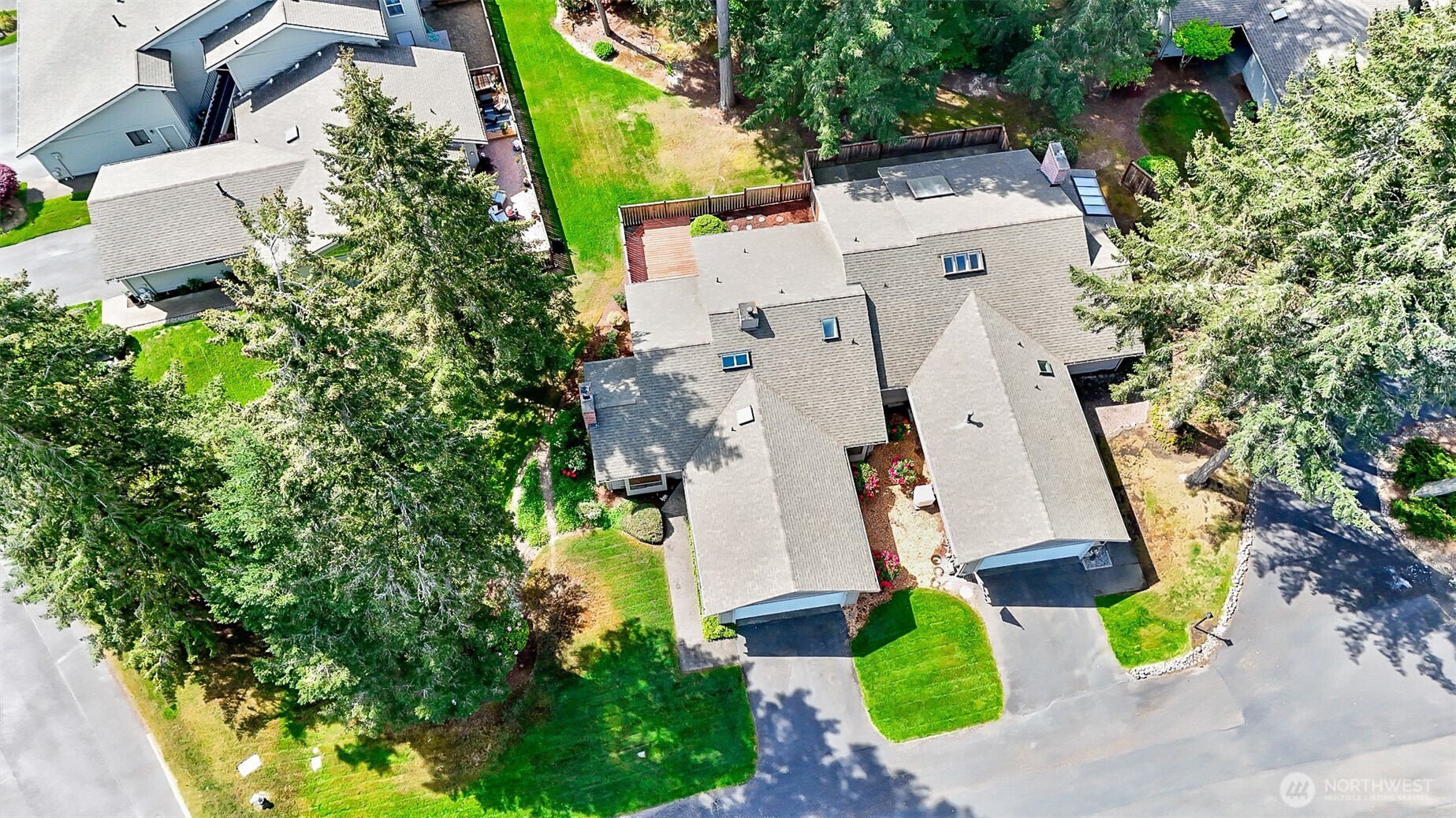1324 Boise Street Fircrest, WA 98466 - Photo 9 of 39 an aerial view of residential houses with outdoor space and trees
